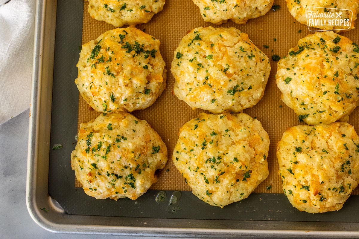 Cheddar Bay Biscuits on a baking sheet.