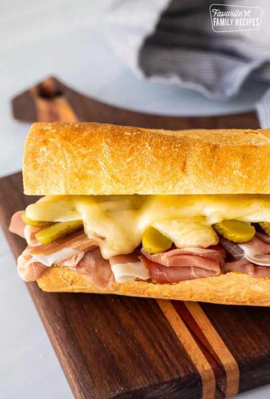 Raclette sandwich on a piece of French baguette.