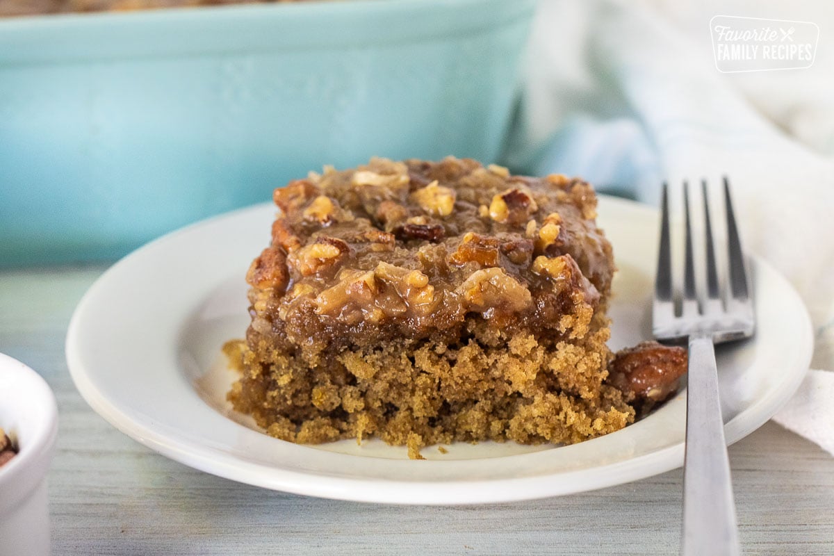 Slice of Oatmeal Cake on a plate with a fork.