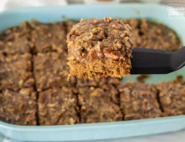 Slice of Oatmeal Cake on a spatula.