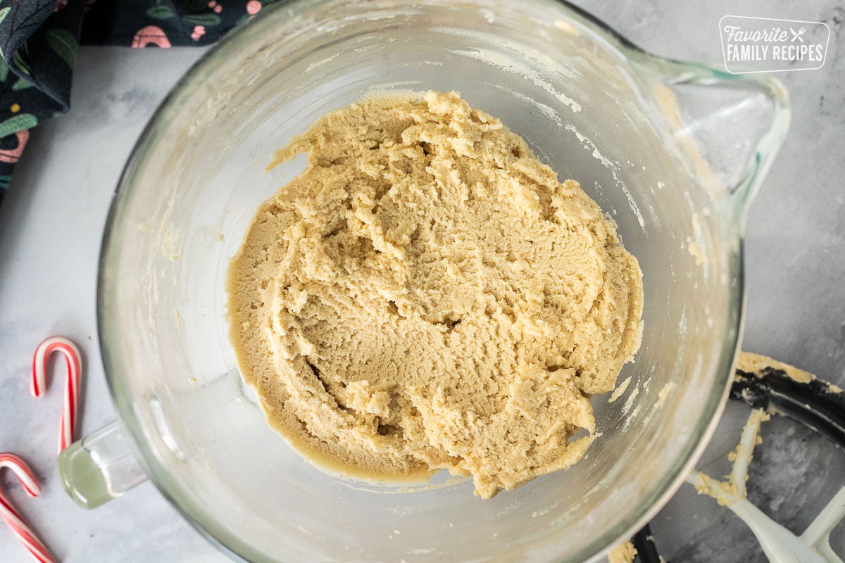 Mixing bowl with candy cane cookie dough.