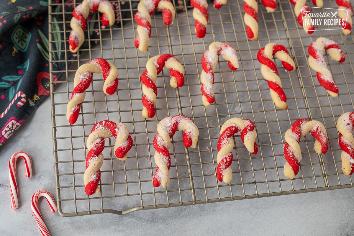 Candy cane cookies on top of a cooling rack.