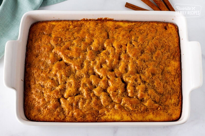 Baked Cinnamon roll cake in a baking dish.