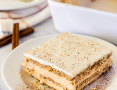 Pumpkin Eclair Cake on a plate.