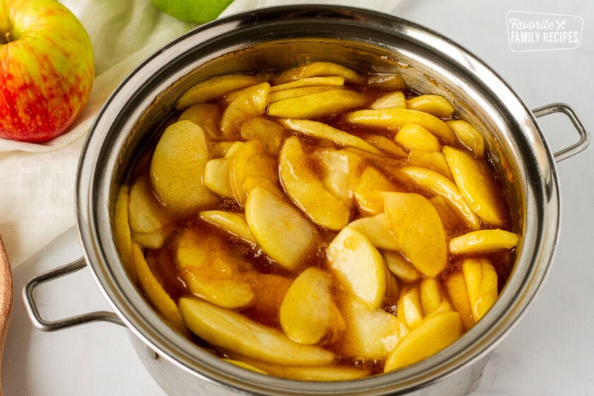 Saucepan of cooked apples for Homemade pie.