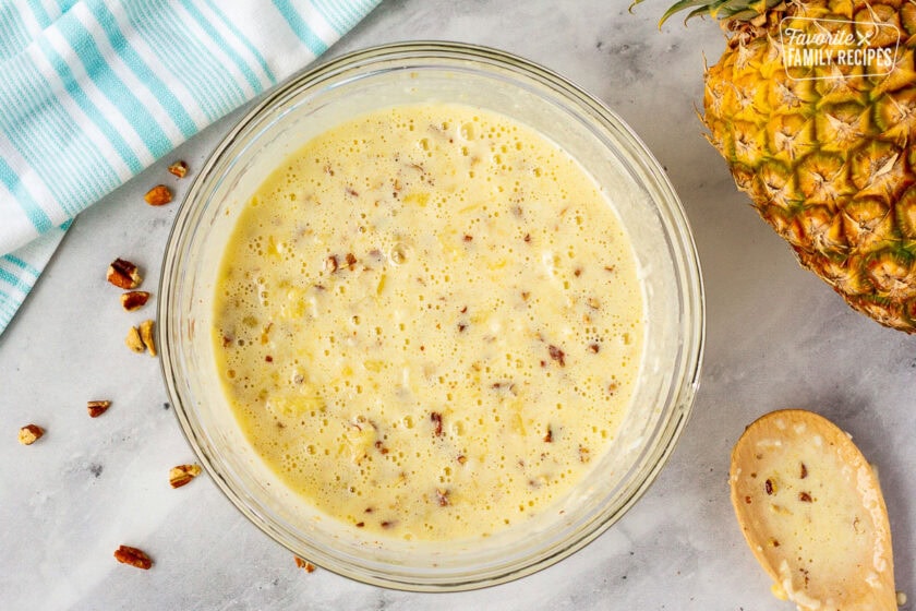 Glass mixing bowl with Island Pecan Pie filling.