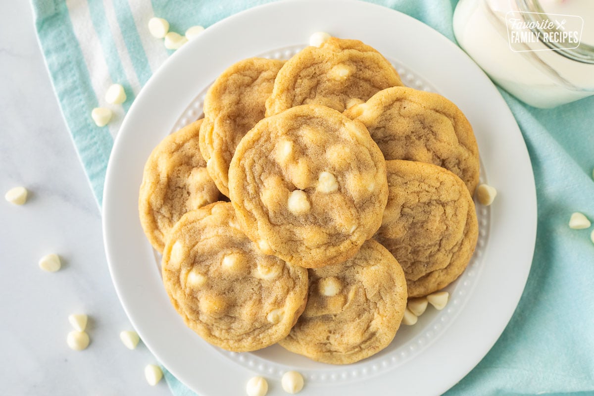 Top view of Vanilla Cookies on a plate with a glass of milk.