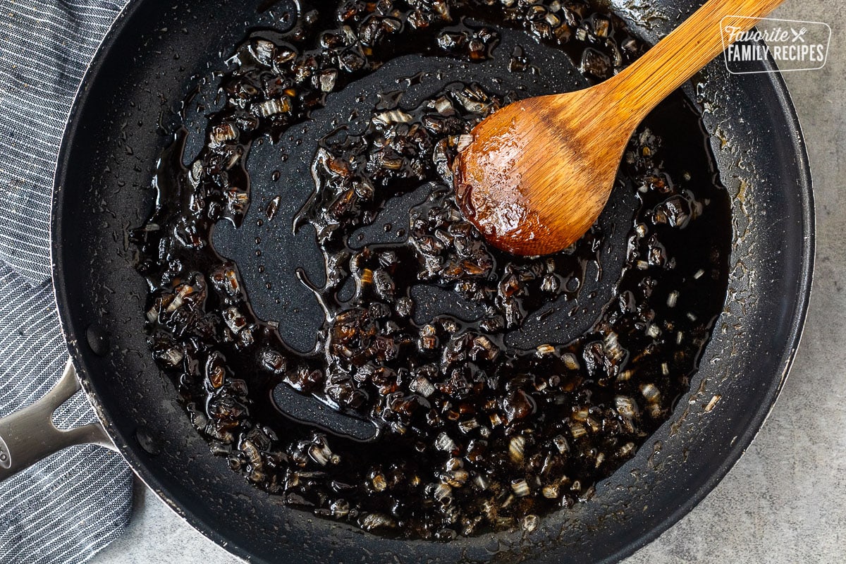 Skillet with onions and balsamic sugar.