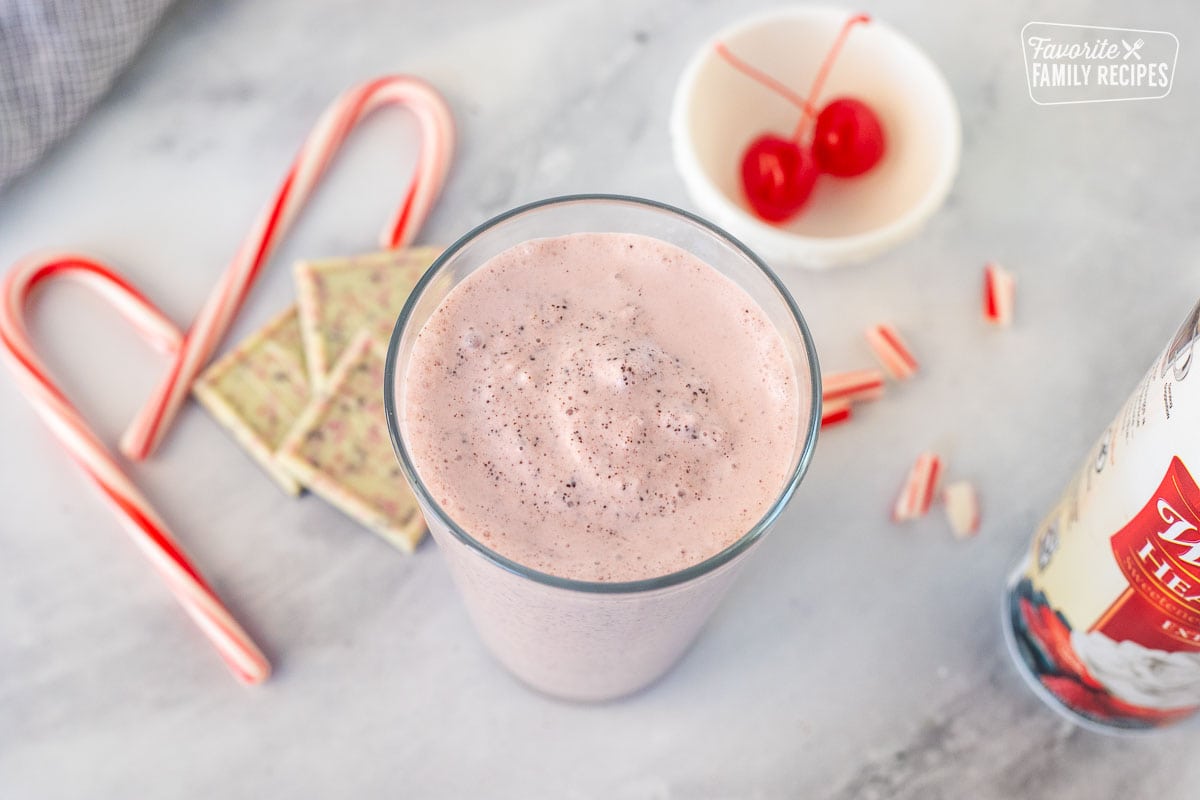 Chick Fil A Peppermint Milkshake and a glass.