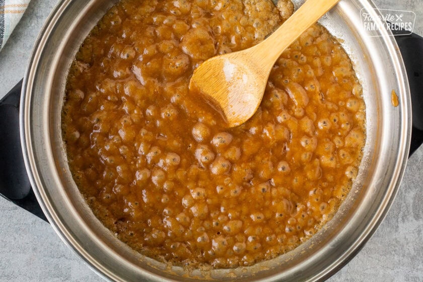 Boiling brown sugar and butter in a large skillet.