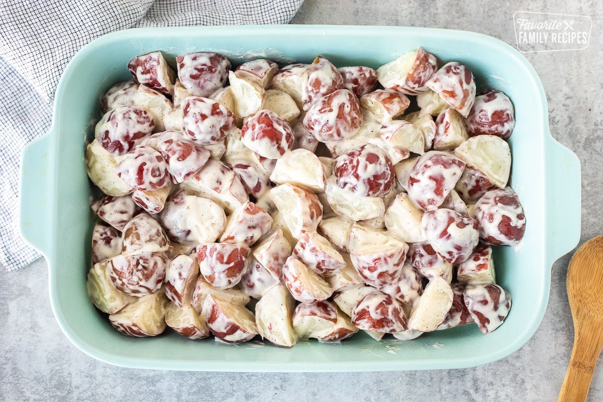 Glass baking dish with ranch red potatoes.