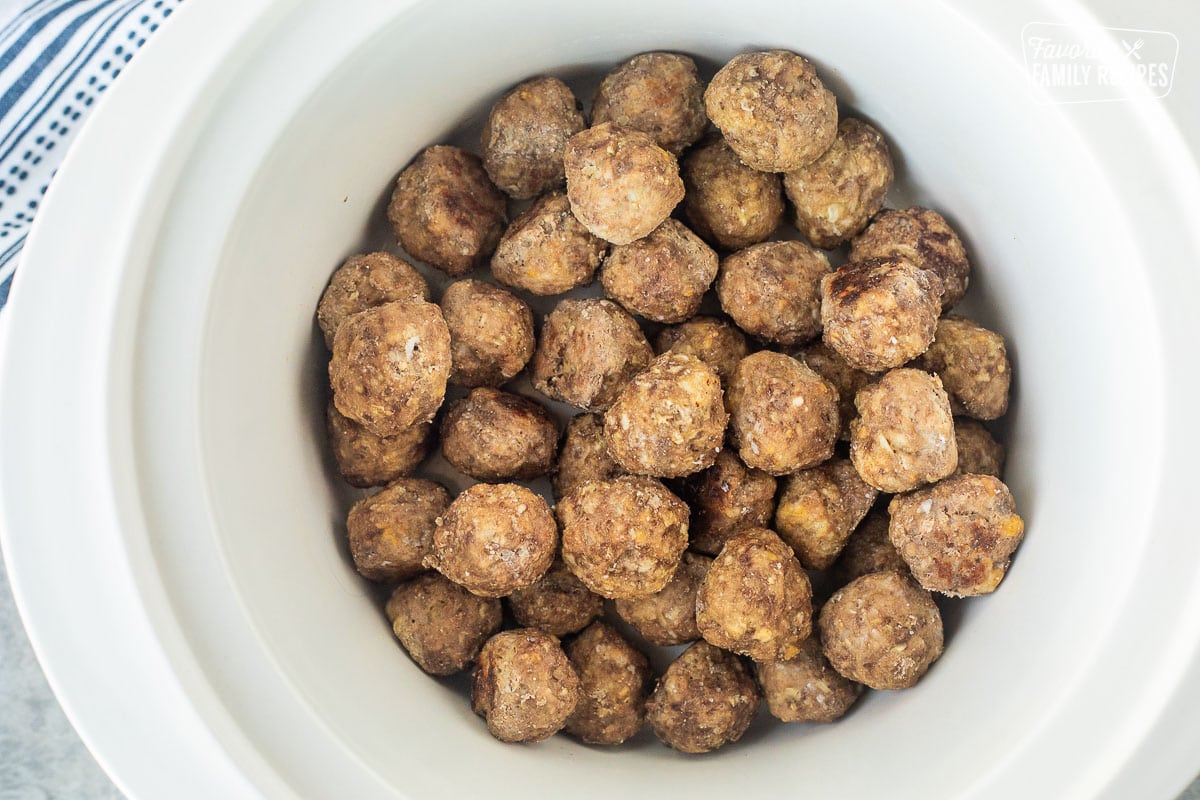 Frozen meatballs in a crockpot.