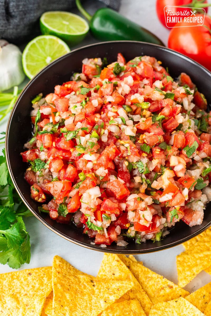 Bowl of fresh pico de Gallo with diced tomatoes, onions, cilantro and jalapeño.