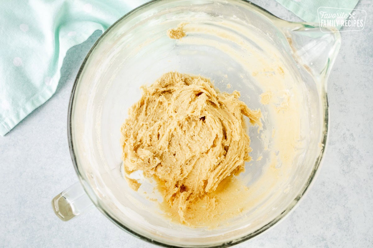 Glass mixing bowl of Italian Easter cookie dough.