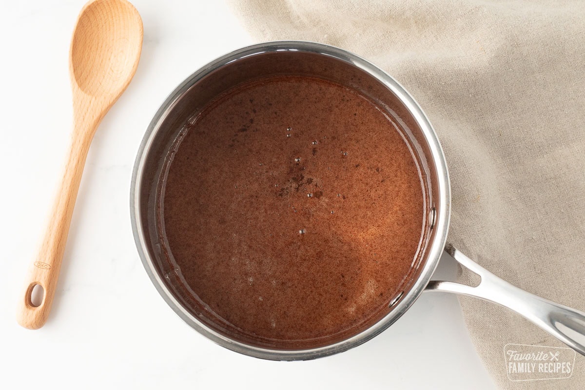 Melted chocolate mixture for no bake cookies in a saucepan