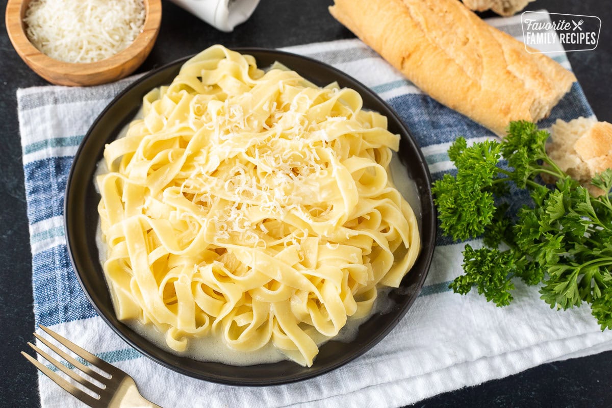 Authentic Fettuccine Alfredo with fresh grated Parmigiana Reggiano cheese.