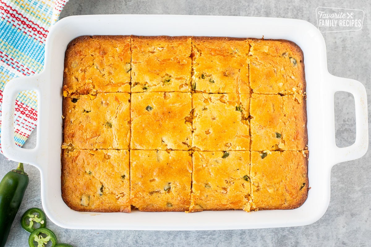 Mexican cornbread sliced in casserole dish.