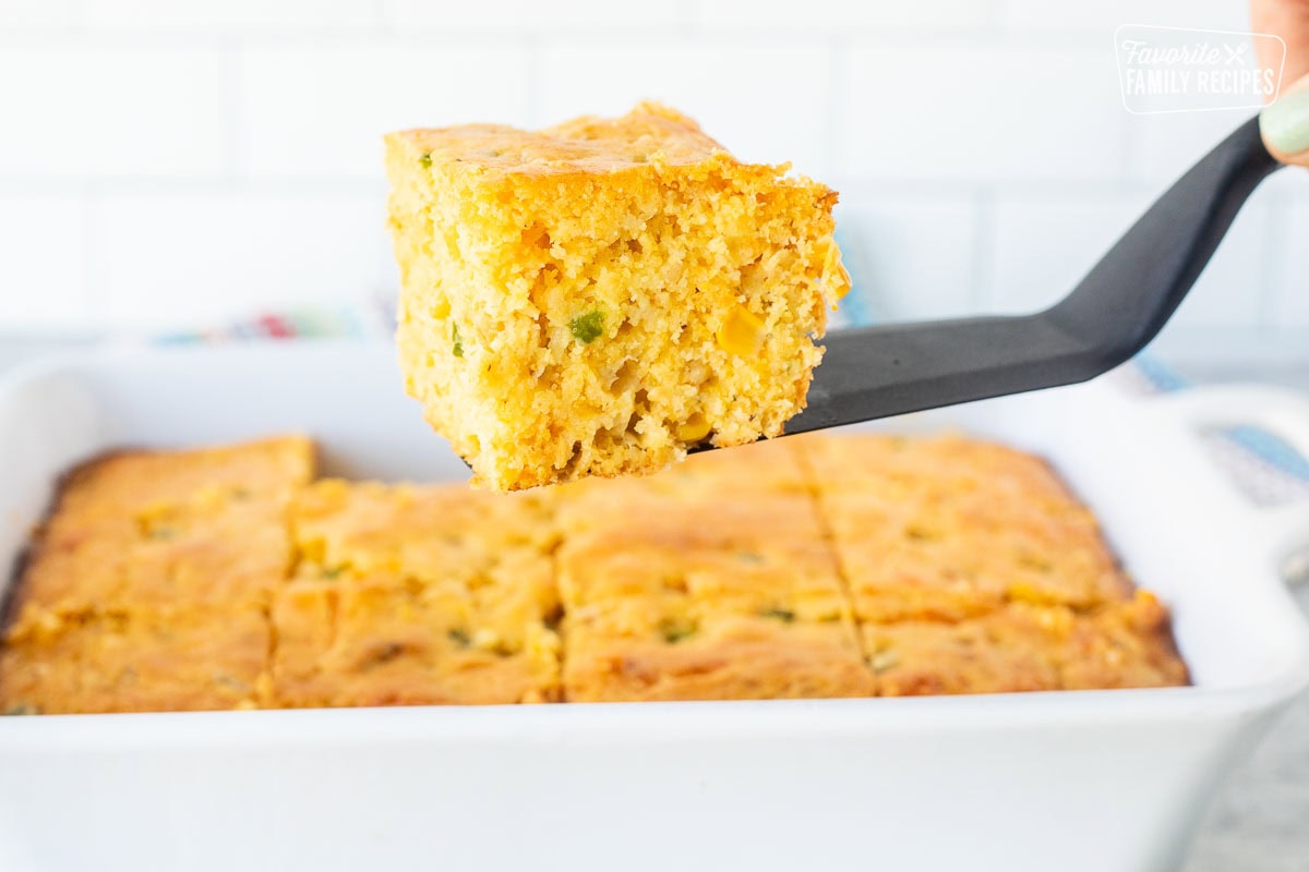 Slice of Mexican cornbread on a spatula.