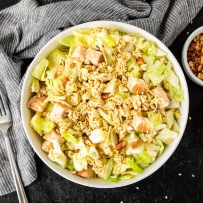 Bowl of Ramen Noodle Salad (Pai Mai topped with almonds, sesame seeds and season toasted ramen noodles.