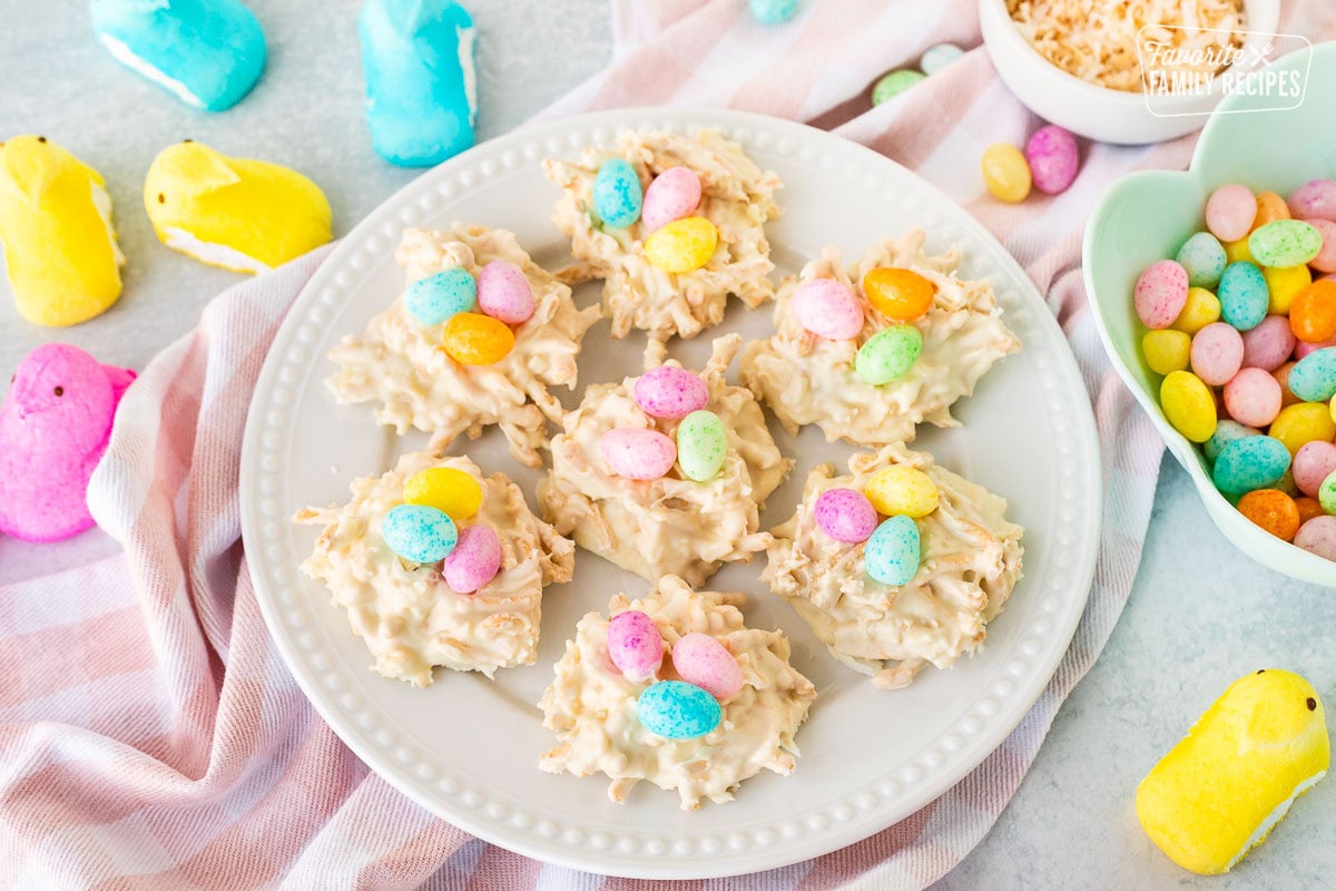 White Chocolate Bird Nests arranged on a plate with jelly beans.